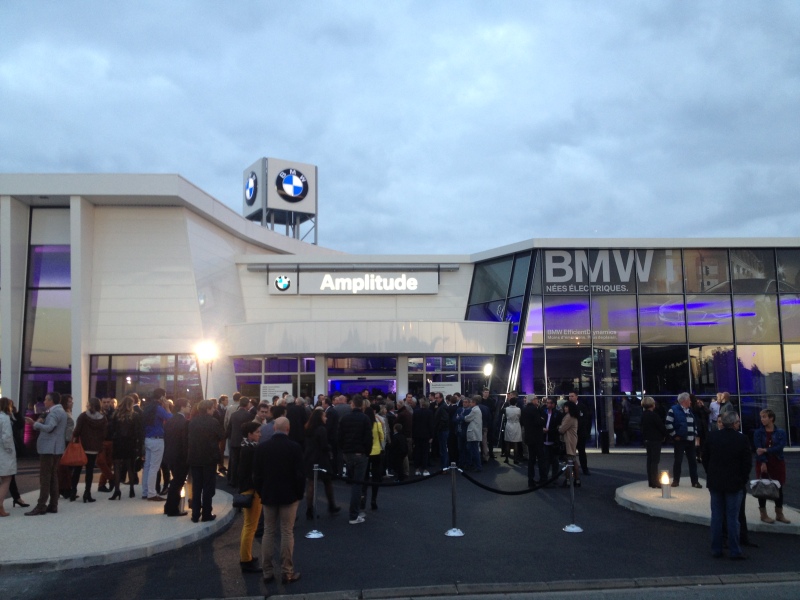 Guests awaiting for the re-opening of the BMW Amplitude Showroom in Tours, by Tungsten.